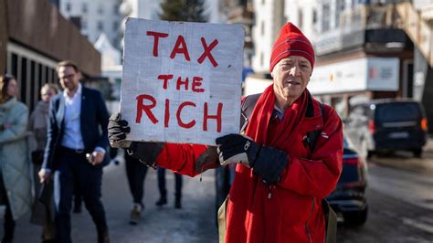 dr phil white|this is why I’m at Davos begging to pay more tax .